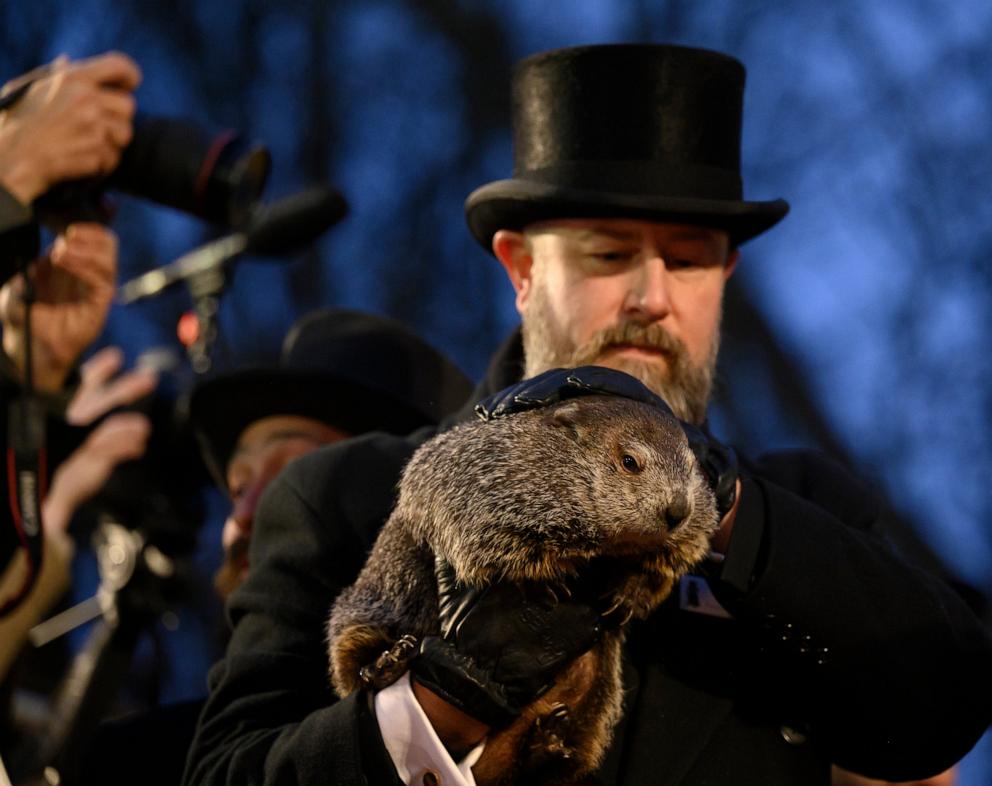 PHOTO: Groundhog handler AJ Dereume holds Punxsutawney Phil after he did not see his shadow predicting an early Spring during the 138th annual Groundhog Day festivities, Feb. 2, 2024, in Punxsutawney, Pa.