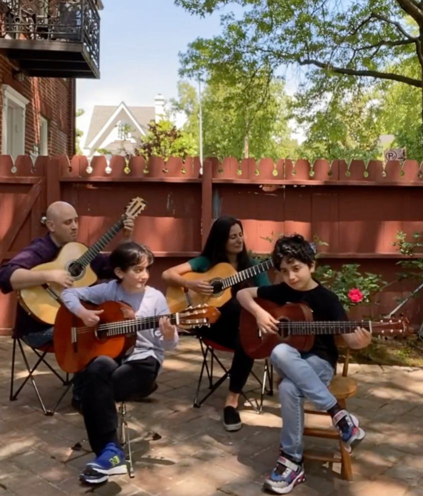 PHOTO: The Hochman family spends up to two hours each day composing and playing music on the guitar at their home in Brooklyn, New York, during the global COVID-19 pandemic.