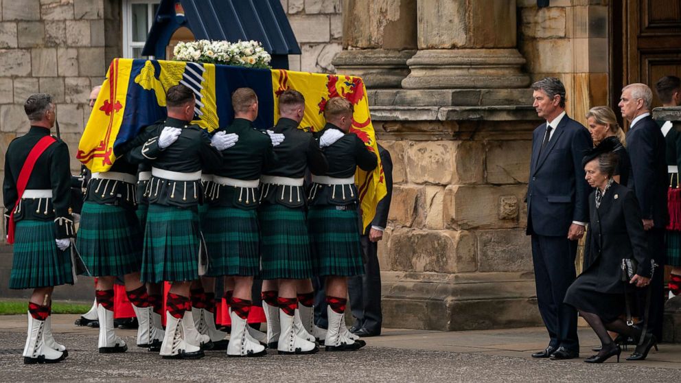 PHOTO: Princess Anne curtseys the coffin of Queen Elizabeth II, as it arrives at Holyroodhouse, Sept. 11, 2022, in Edinburgh, United Kingdom. 