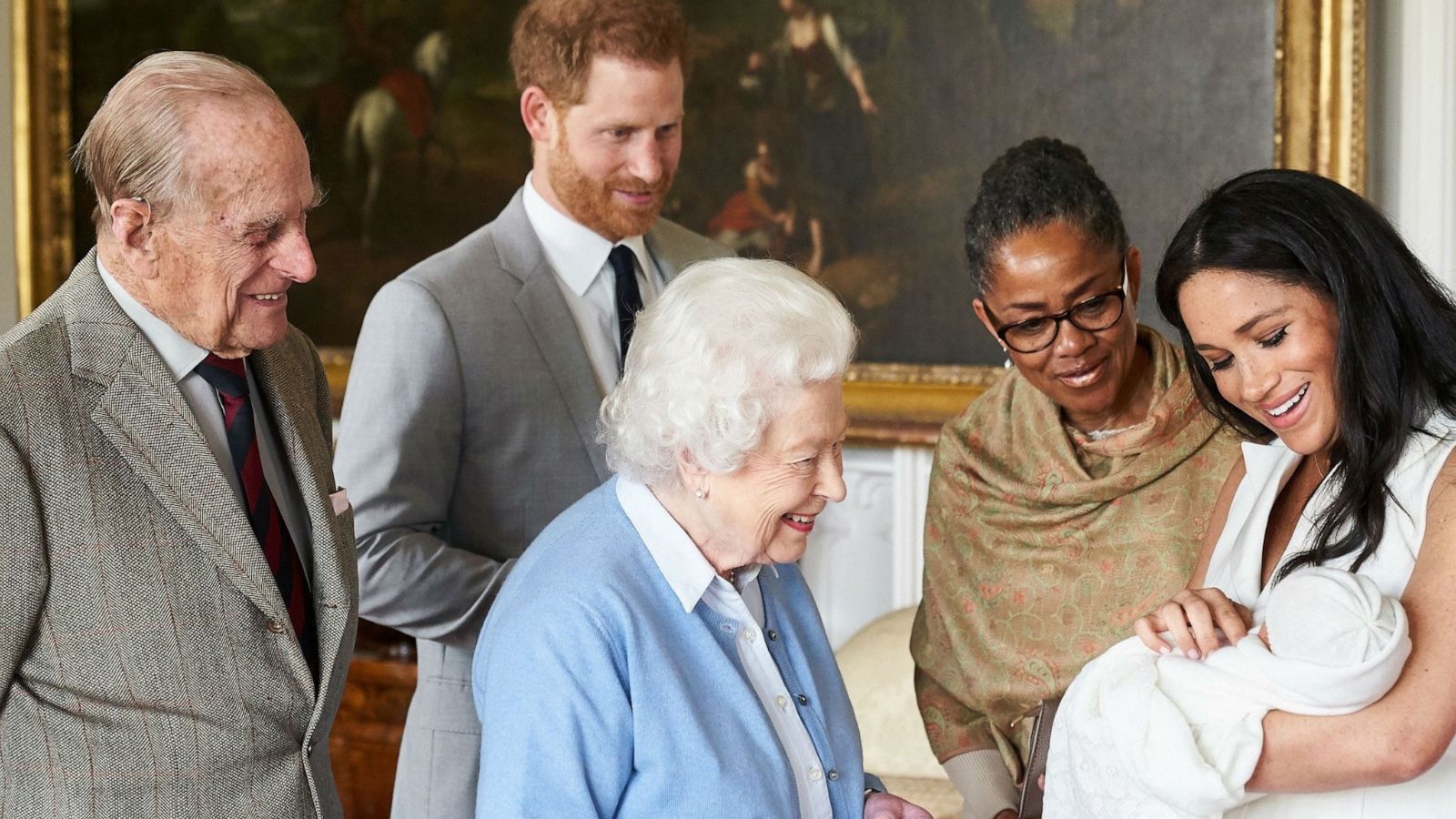 PHOTO: Britain's Queen Elizabeth II is introduced to her new great-grandchild, Archie Harrison Mountbatten-Windsor, while Prince Philip, Prince Harry and Duchess Meghan and Doria Ragland look on, May 8, 2019.