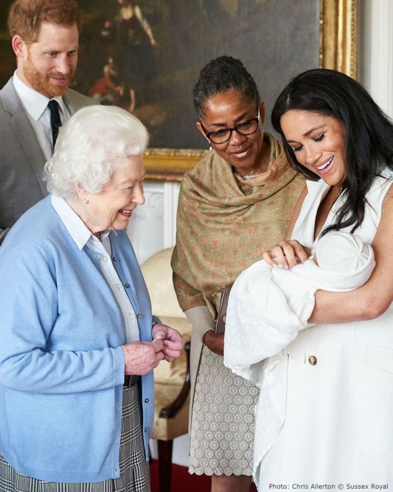 PHOTO: Britain's Queen Elizabeth II is introduced to her new great-grandchild, Archie Harrison Mountbatten-Windsor, while Prince Philip, Prince Harry and Duchess Meghan and Doria Ragland look on, May 8, 2019.