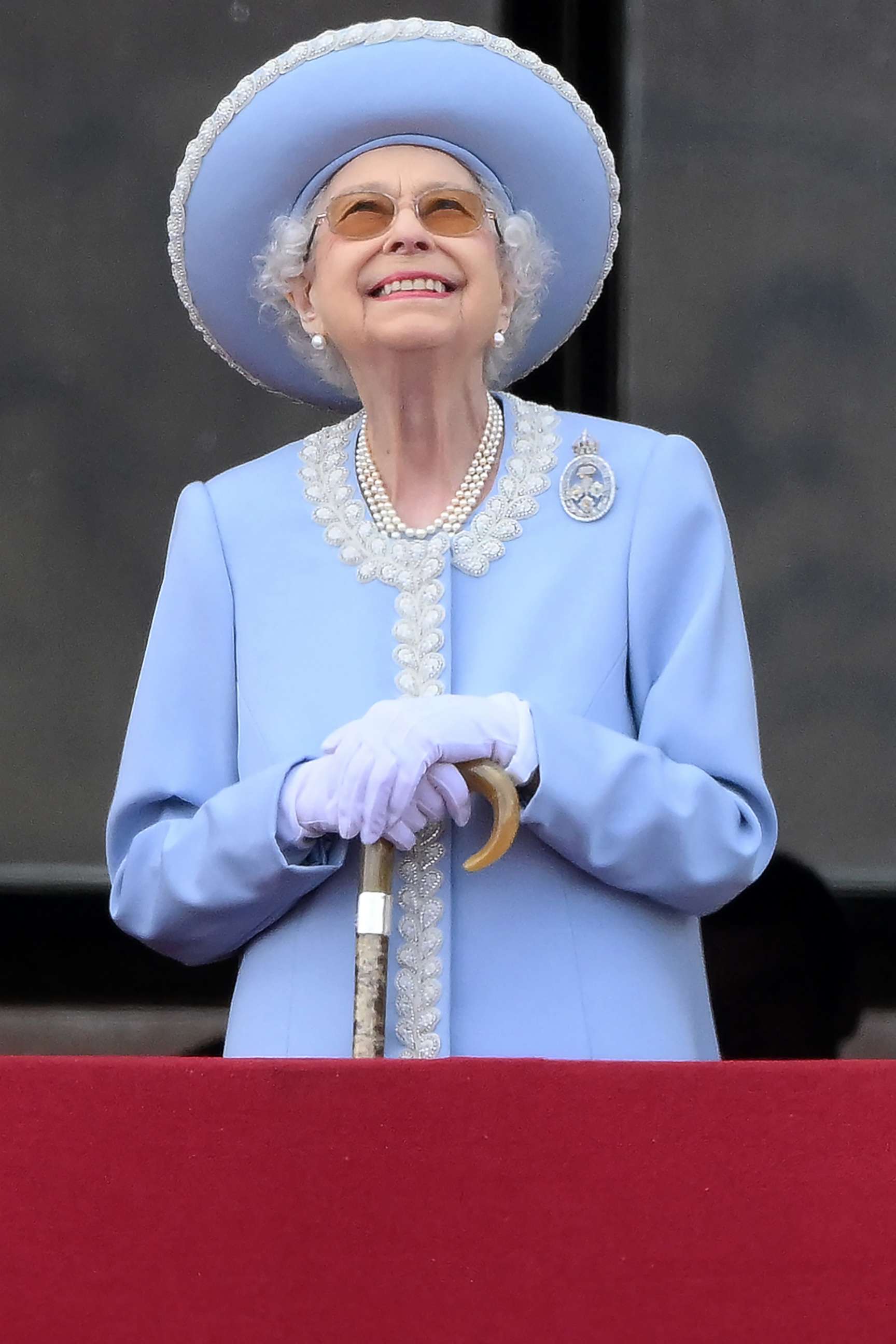 PHOTO: Britain's Queen Elizabeth II watches a flypast from Buckingham Palace balcony, June 2, 2022, in London. 
