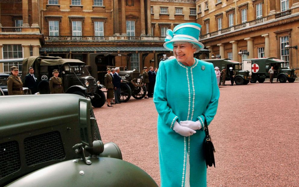 PHOTO: Queen Elizabeth ll looks at vintage vehicles used by the First Aid Nursing Yoemanry during World War II, in which the Queen herself served, in the quadrangle at Buckingham Palace on June 28, 2007 in London, England.