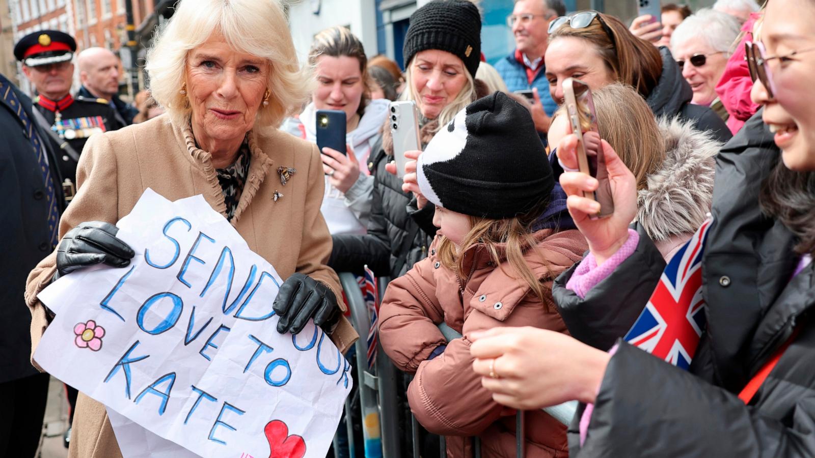 PHOTO: Britain's Queen Camilla receives a message of support for Princess Catherine, during her visit to the Farmers' Market, March 27, 2024, in Shrewsbury, England.