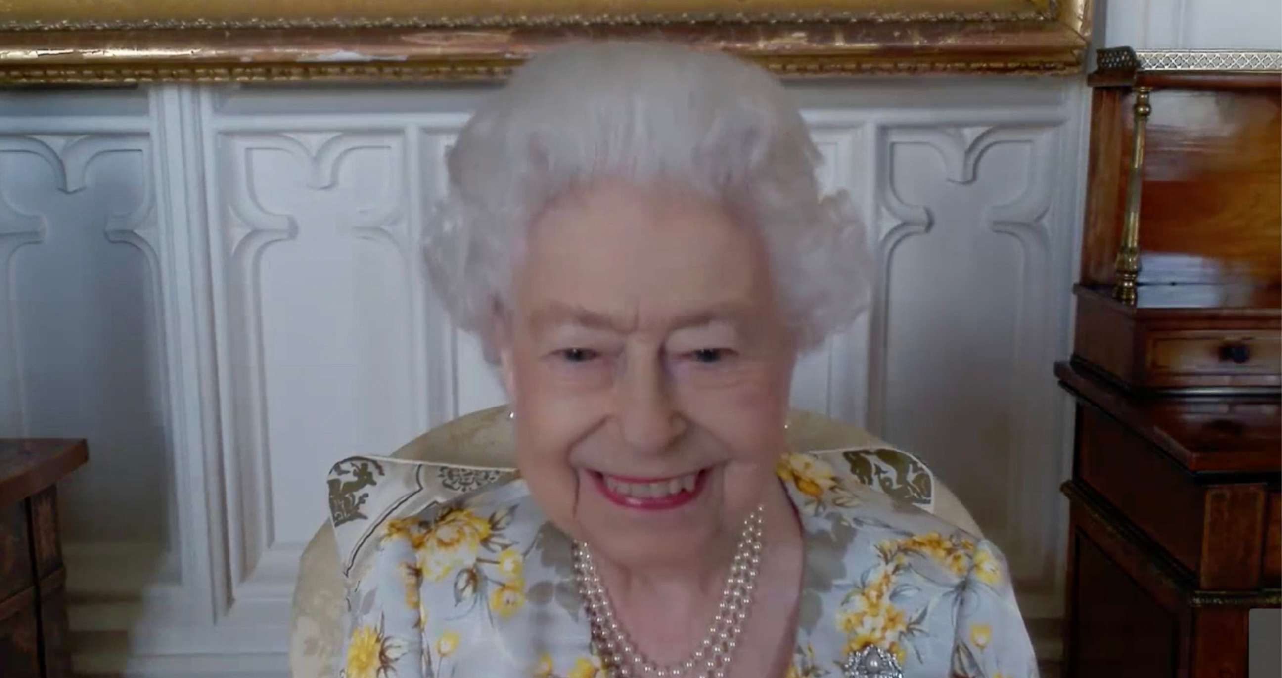 PHOTO: Queen Elizabeth II speaks to NHS Key workers via video call to hear about their experiences of working on the front line during the pandemic to mark the official opening of the hospital's Queen Elizabeth Unit, April 6, 2022, in London.