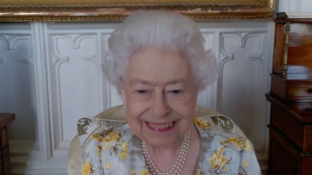 PHOTO: Queen Elizabeth II speaks to NHS Key workers via video call to hear about their experiences of working on the front line during the pandemic to mark the official opening of the hospital's Queen Elizabeth Unit, April 6, 2022, in London.
