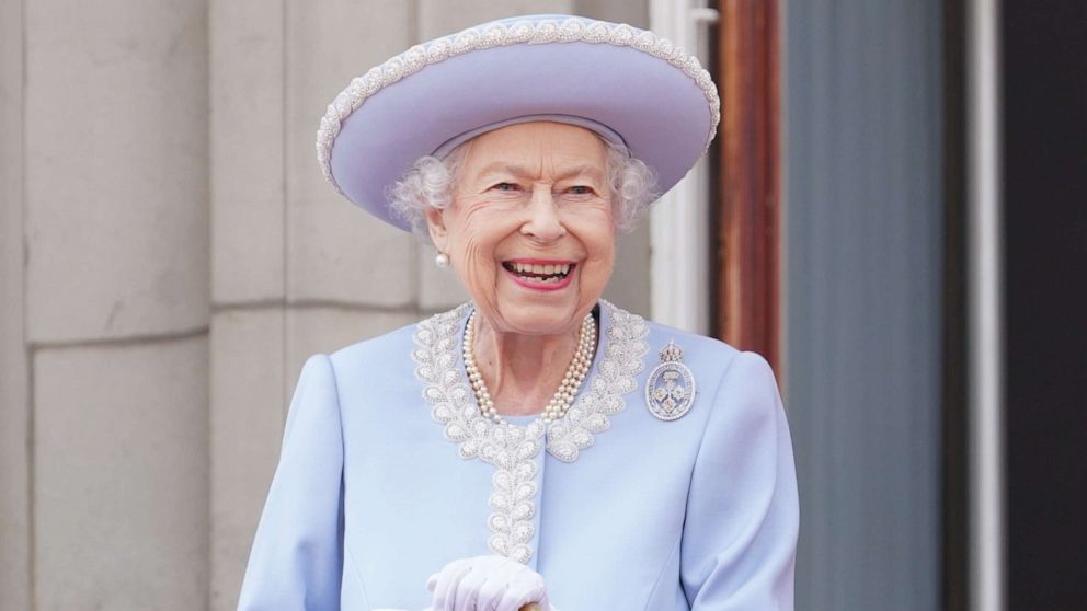 PHOTO: Queen Elizabeth II watches from the balcony of Buckingham Palace during the Trooping the Colour parade the Trooping the Colour parade, June 2, 2022, in London.