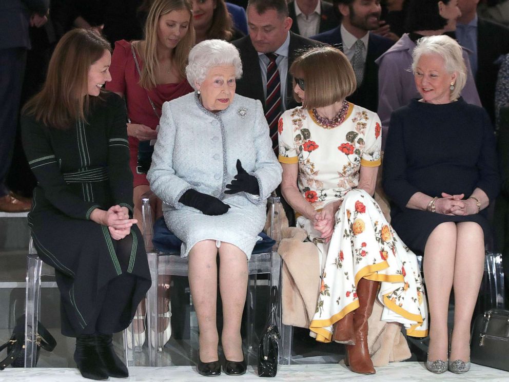 PHOTO: Queen Elizabeth II sits next to Anna Wintour and Caroline Rush (left), and royal dressmaker Angela Kelly at a show during London Fashion Week, on February 20, 2018. 