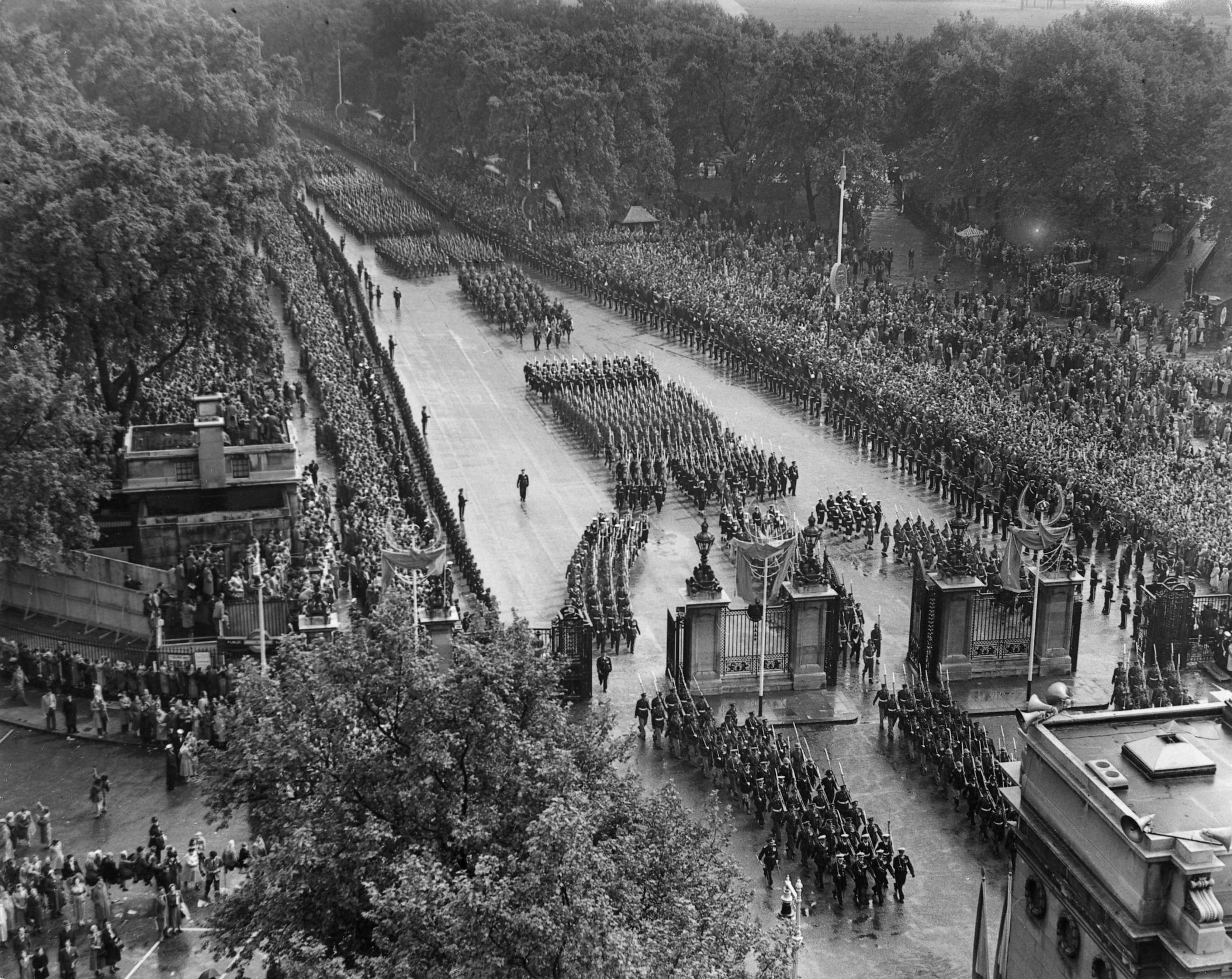 PHOTO: Crowds line South Carriage Drive, Hyde Park as Queen Elizabeth II's coronation procession passes, June 2, 1953, in London.