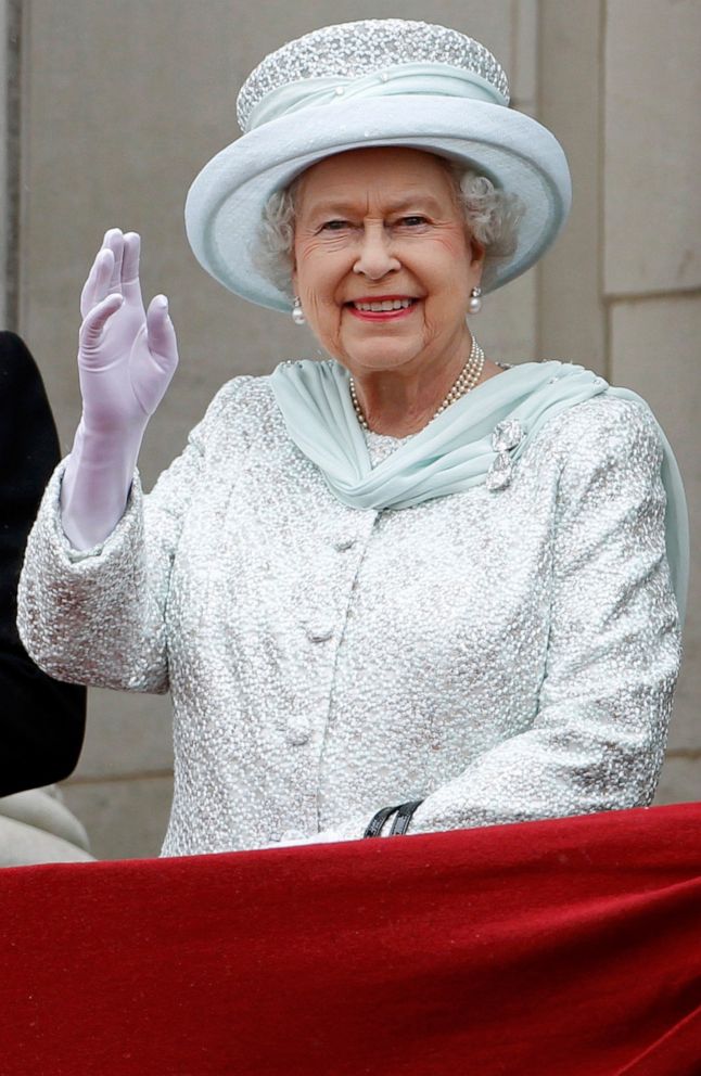 PHOTO: Queen Elizabeth II waves from the balcony of Buckingham Palace during the finale of the Queen's Diamond Jubilee celebrations on June 5, 2012, in London.