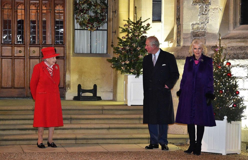 PHOTO: Queen Elizabeth II talks with Prince Charles and Camilla, Duchess of Cornwall at Windsor Castle in Windsor, England, Dec. 8, 2020.