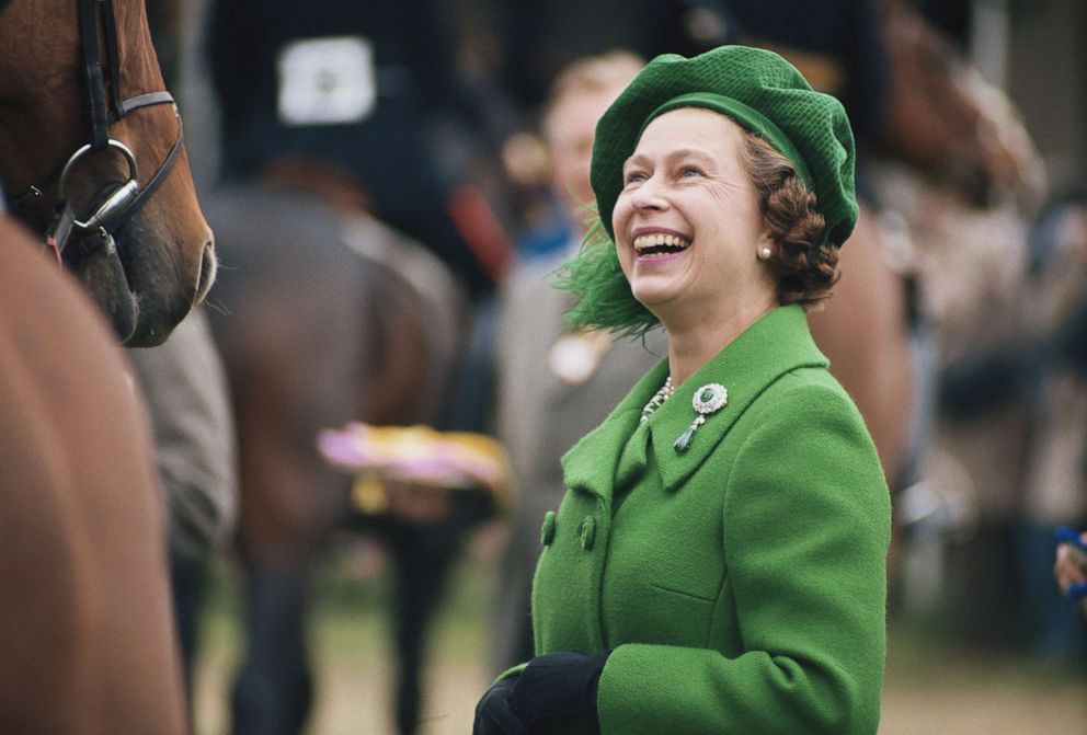 PHOTO: Queen Elizabeth II, wearing a green coat and matching hat, attends the Royal Windsor Horse Show, held at Home Park in Windsor, Berkshire, England, circa 1980.