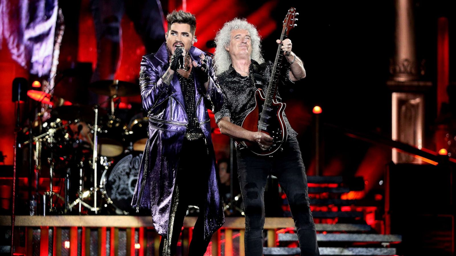 PHOTO: Adam Lambert performs alongside Brian May of Queen at ANZ Stadium, Feb. 15, 2020, in Sydney, Australia.