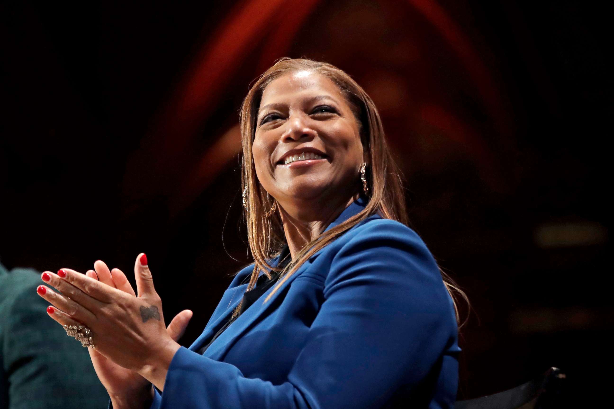 PHOTO: Queen Latifah applauds during ceremonies at Harvard University awarding the W.E.B. Dubois Medals for contributions to black history and culture, Oct. 22, 2019, in Cambridge, Mass.