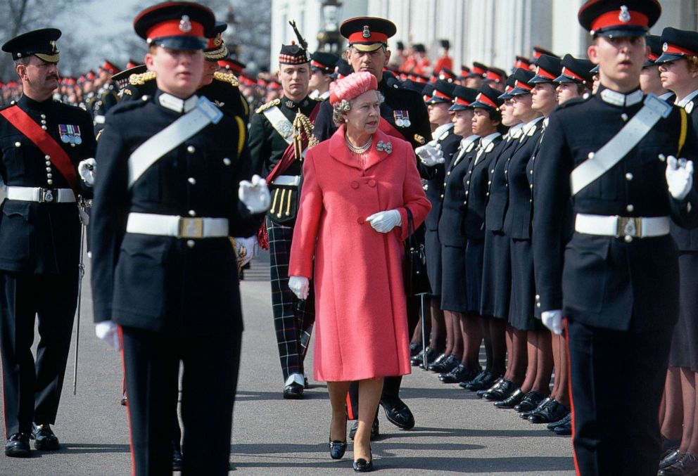 PHOTO: Queen Elizabeth II inspects the troops at the passing out parade at Sandhurst Military Academy in Berkshire, England, in 1985.