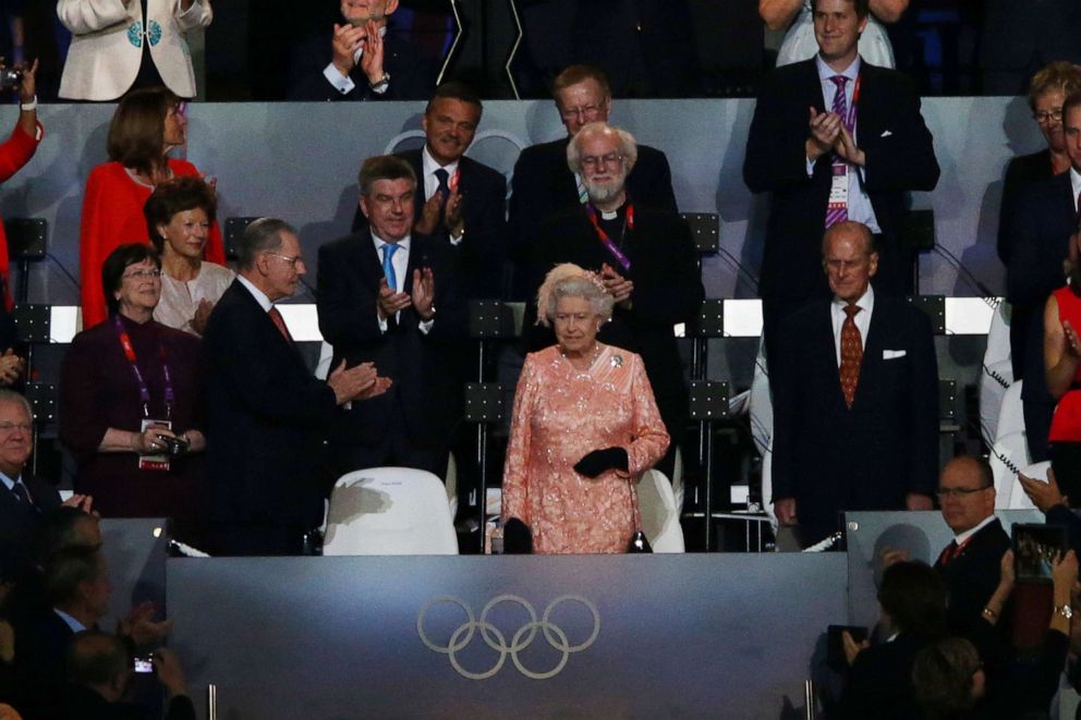 PHOTO: Queen Elizabeth II and Prince Philip, Duke of Edinburgh arrive during the Opening Ceremony of the London 2012 Olympic Games at the Olympic Stadium, July 27, 2012, in London.