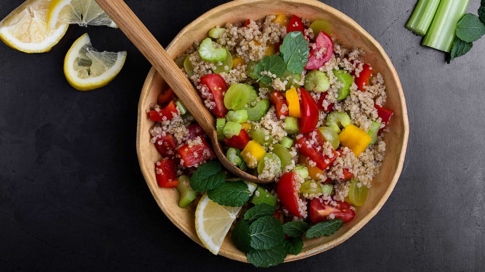PHOTO: Quinoa salad with red and yellow bell peppers, tomatoes, celery and grapes.