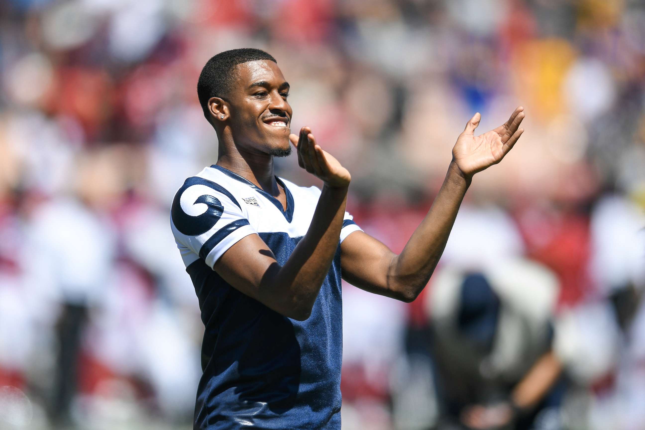 PHOTO: Los Angeles Rams cheerleader Quinton Peron, one of the first male NFL cheerleaders, cheers ahead of the game against the Arizona Cardinals at Los Angeles Memorial Coliseum, Sept. 16, 2018 in Los Angeles.