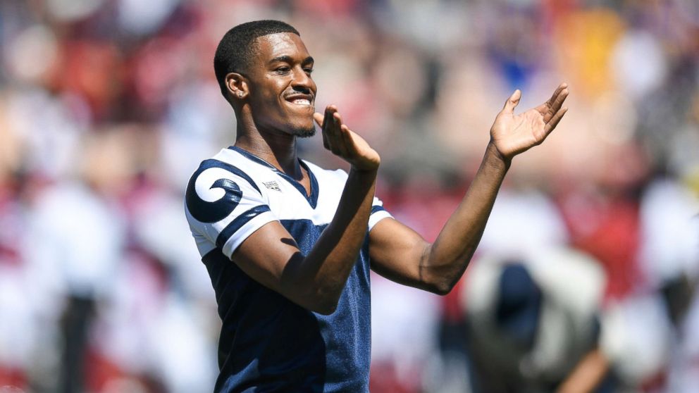 PHOTO: Los Angeles Rams cheerleader Quinton Peron, one of the first male NFL cheerleaders, cheers ahead of the game against the Arizona Cardinals at Los Angeles Memorial Coliseum, Sept. 16, 2018 in Los Angeles.