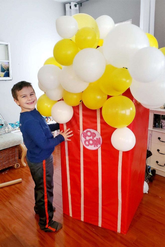 PHOTO: Carter poses with one of the props his mom made for his 'QMC' or 'Quarantine Movie Cinema' birthday.