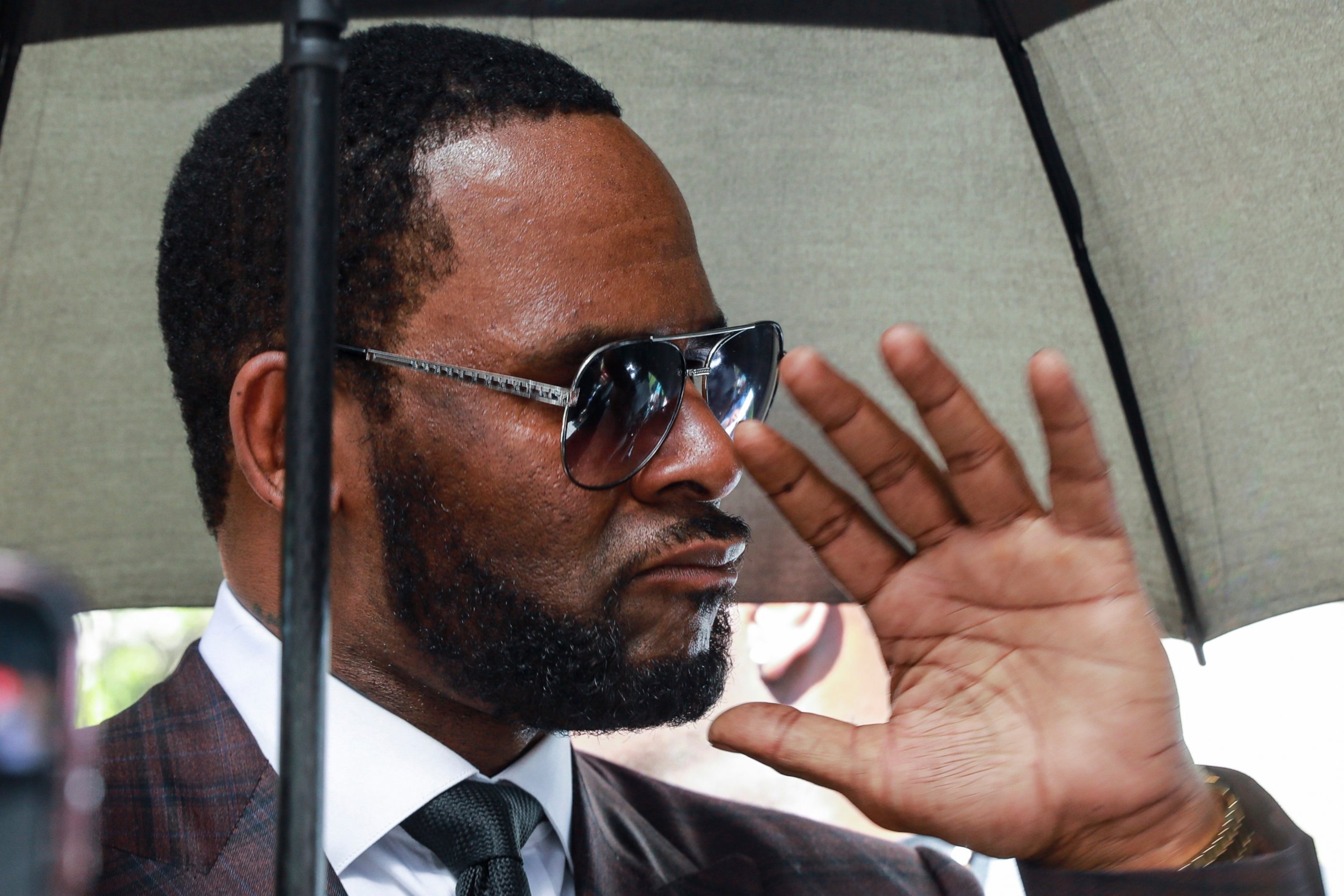 PHOTO: In this June 26, 2019, file photo, Musician R. Kelly departs from the Leighton Criminal Court building after a status hearing in his criminal sexual abuse trial in Chicago. 