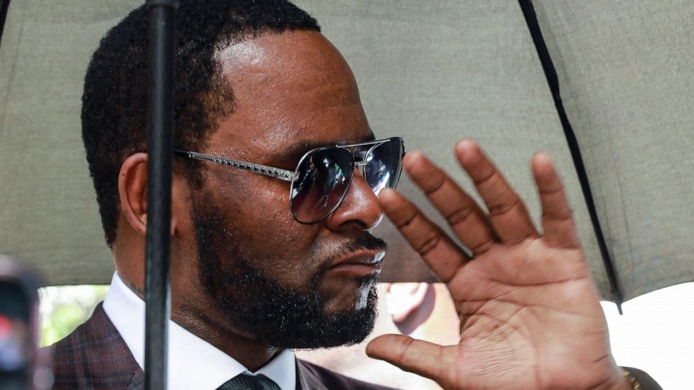 PHOTO: In this June 26, 2019, file photo, Musician R. Kelly departs from the Leighton Criminal Court building after a status hearing in his criminal sexual abuse trial in Chicago.
