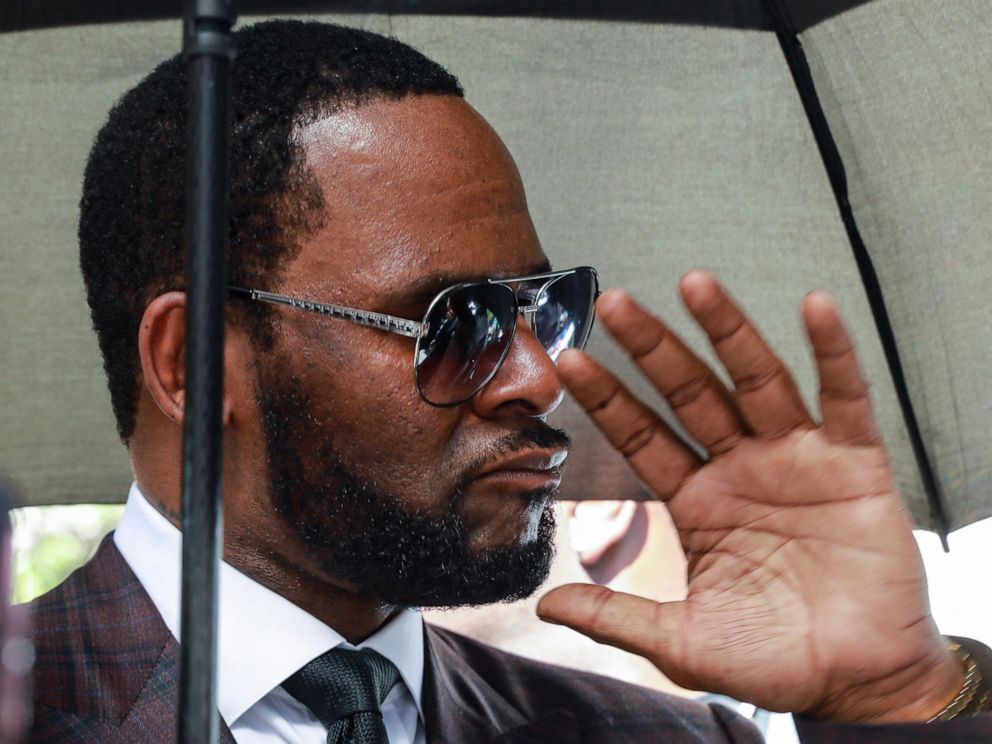 PHOTO: On June 26, 2019, photo of the record, musician R. Kelly leaves the Leighton Criminal Court building after a pre-trial hearing of his sexual assault trial in Chicago. 