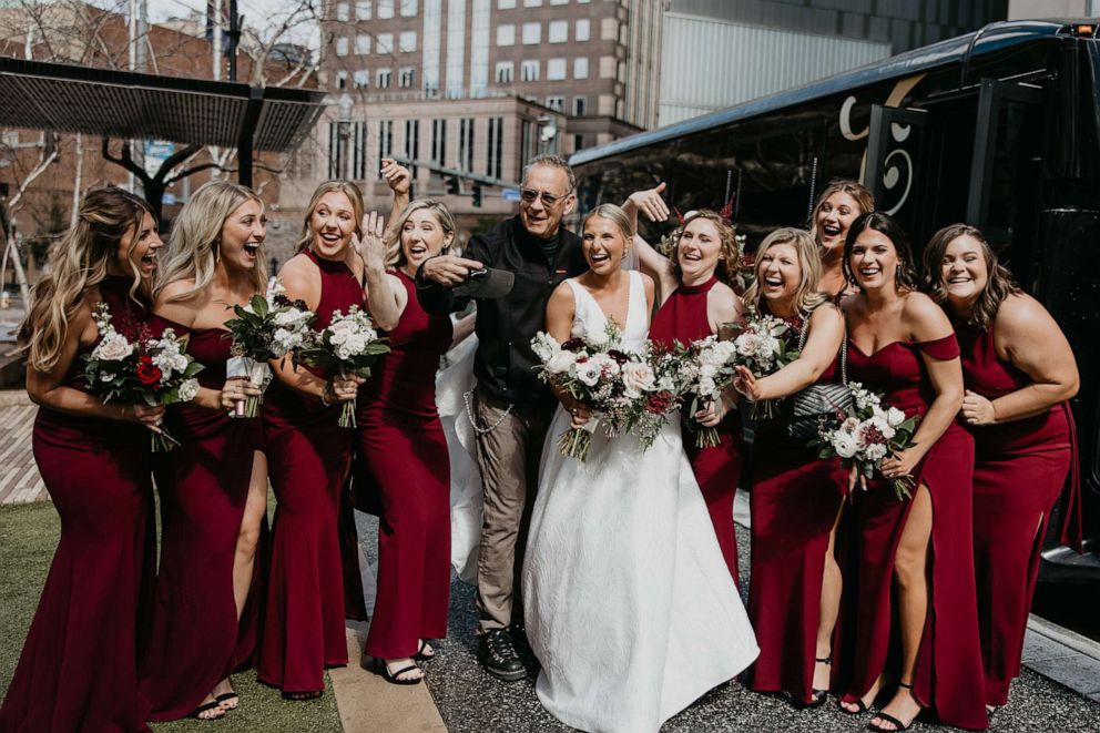 PHOTO: Tom Hanks poses with Grace Weiers and her bridesmaids on Weiers's wedding day, March 19, 2022, in Pittsburgh.