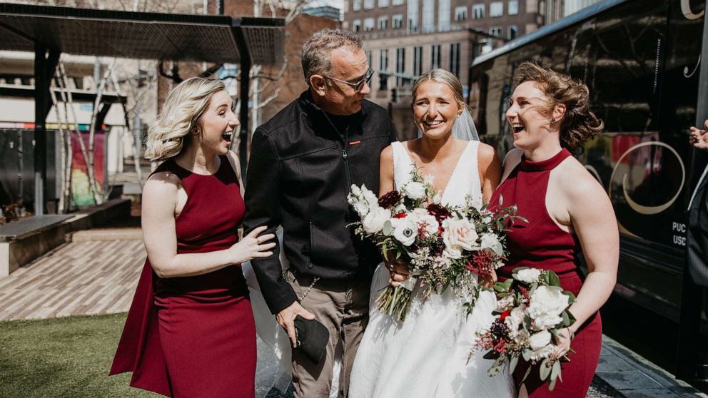 PHOTO: Tom Hanks poses with Grace Weiers and her bridesmaids on Weiers's wedding day, March 19, 2022, in Pittsburgh.