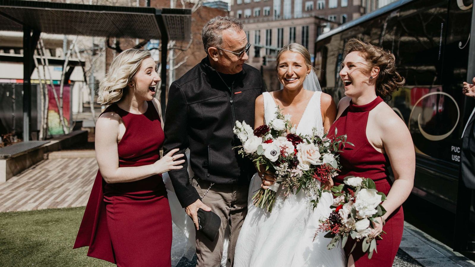 PHOTO: Tom Hanks poses with Grace Weiers and her bridesmaids on Weiers's wedding day, March 19, 2022, in Pittsburgh.