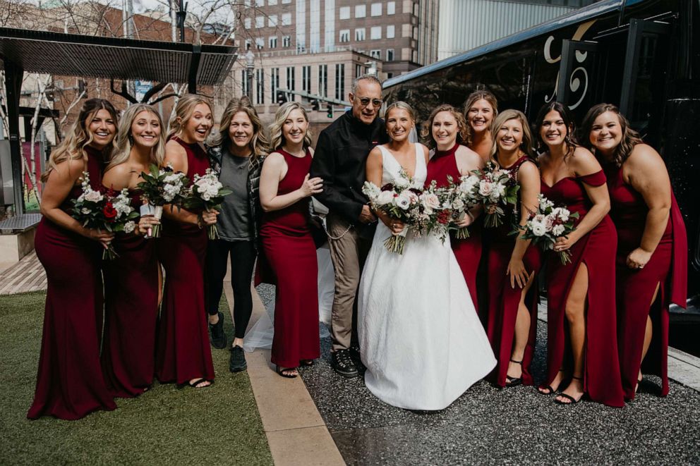 PHOTO: Tom Hanks and Rita Wilson pose with Grace Weiers and her bridesmaids on Weiers's wedding day, March 19, 2022, in Pittsburgh.