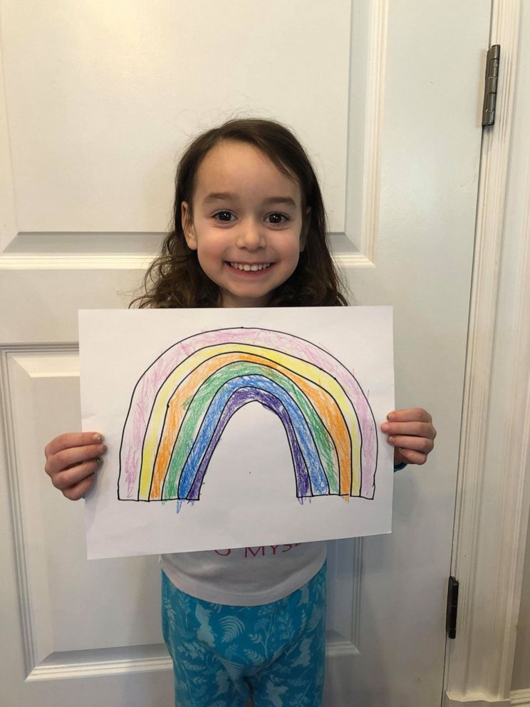 PHOTO: Mackenzie Mandel, 4, holds a rainbow she created to spread hope and joy in her Long Island, New York, community amid the coronavirus crisis.