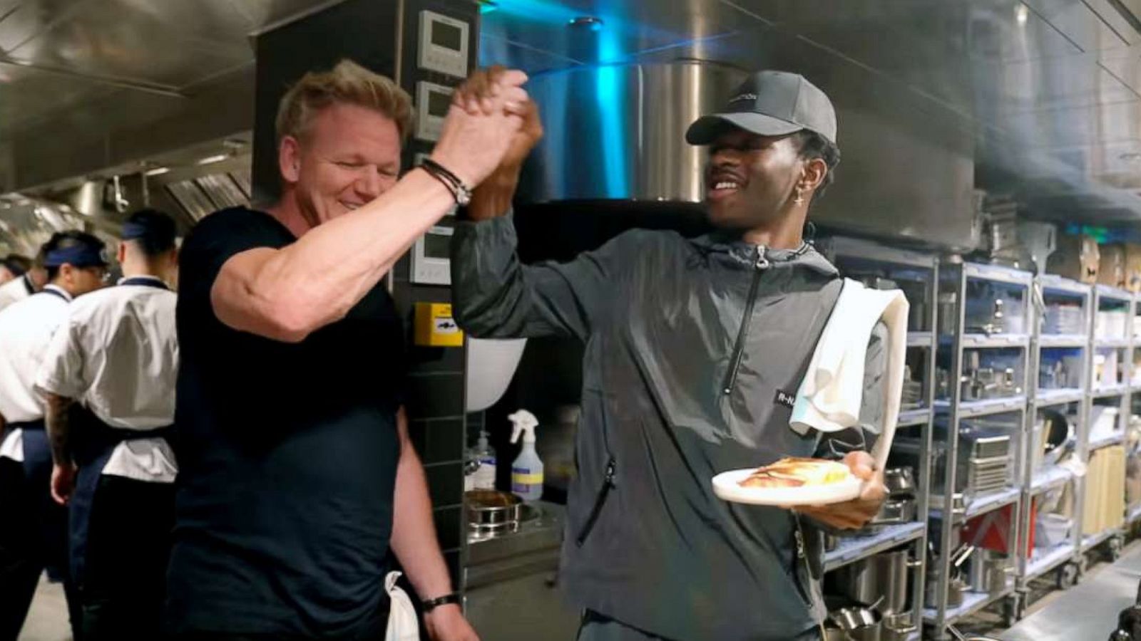 PHOTO: Gordon Ramsay teaches Lil Nas X how to make a panini.