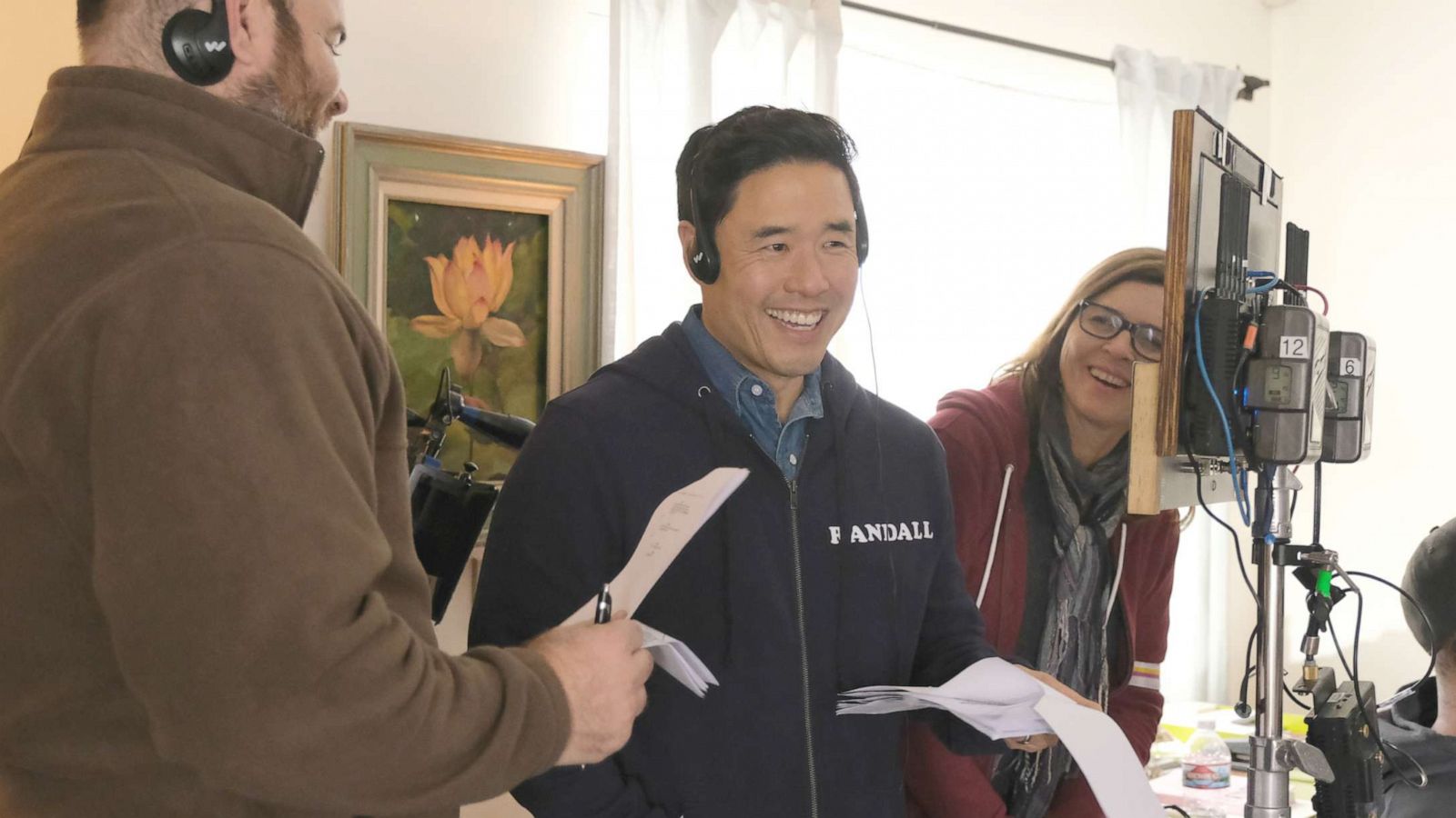 PHOTO: Randall Park, center, who plays patriarch Louis Huang on the ABC comedy "Fresh Off the Boat," makes his TV directorial debut directing the final episode of the series.