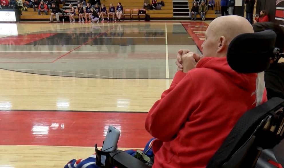 PHOTO: Randy Knecht watches on as his daughter, Ana, plays for Cochrane-Fountain City High School in Fountain City, Wis.