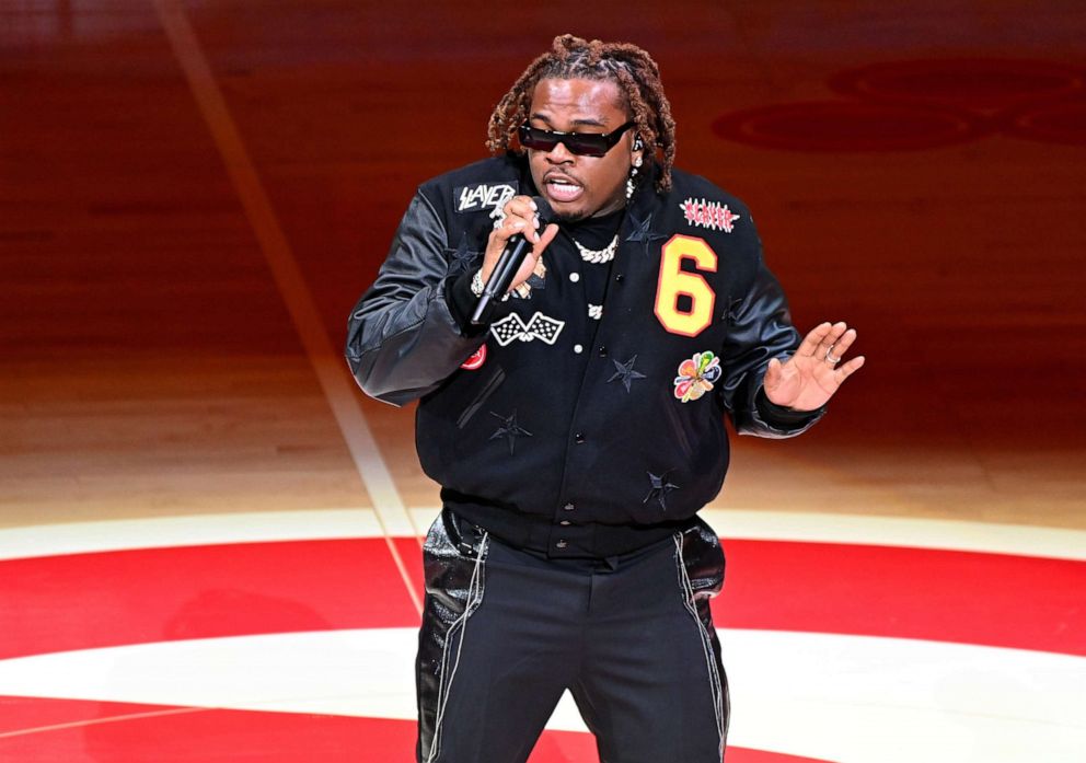 PHOTO: In this Nov. 17, 2021, file photo, rapper Gunna performs at halftime during the Boston Celtics v Atlanta Hawks game at State Farm Arena in Atlanta.