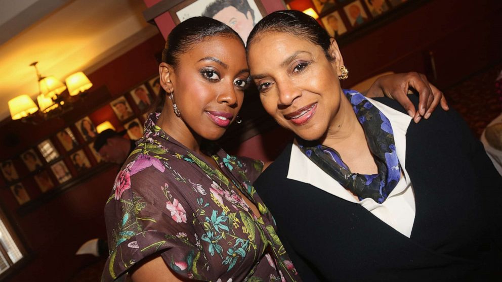 PHOTO: Condola Rashad and her mother Phylicia Rashad pose as Condola Rashad recieves her caricature for her role in the MTC play "St. Joan" at Sardis, May 10, 2018, in New York.