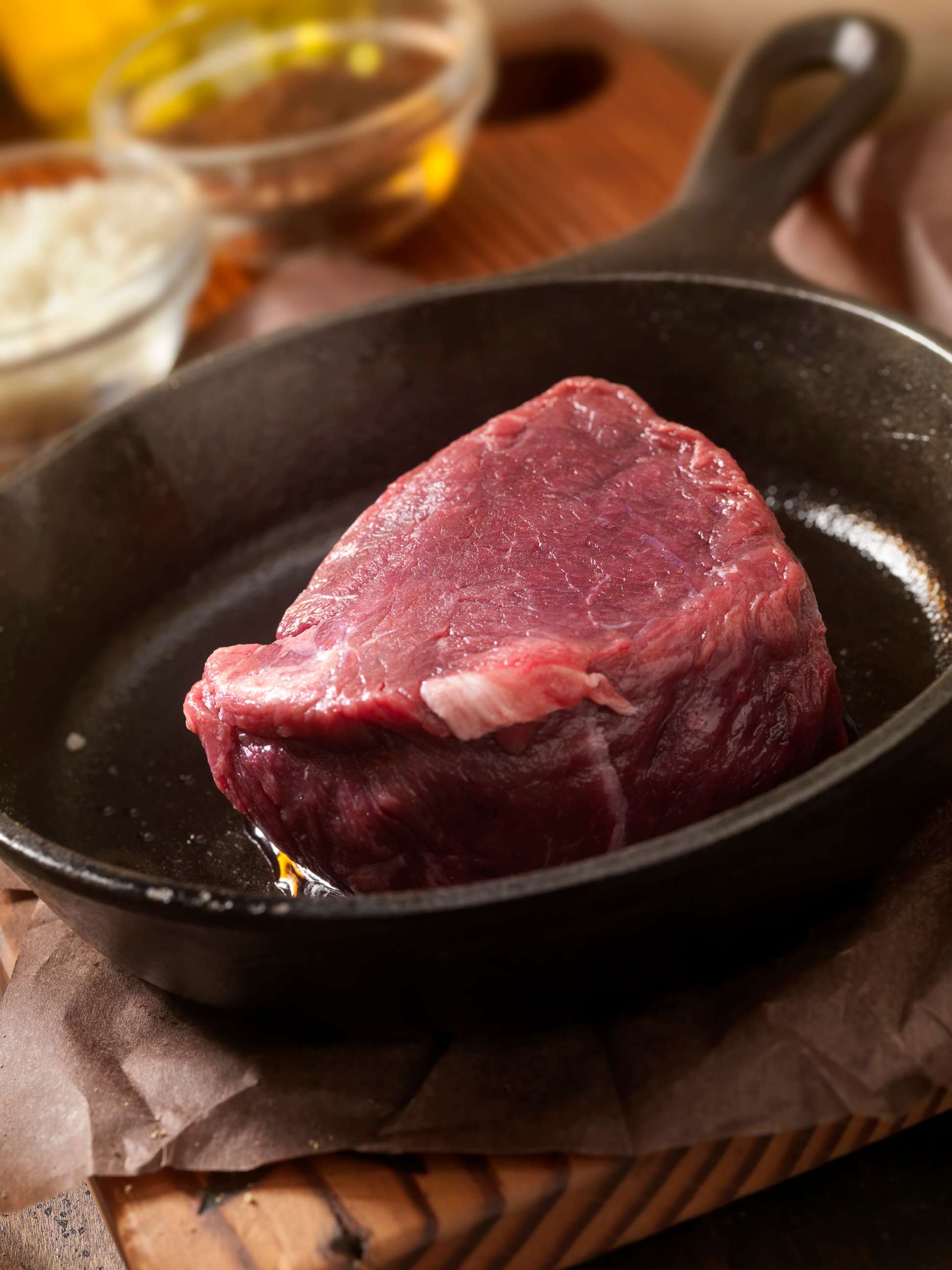 PHOTO: Steak fillet is prepared to be cooked in a cast iron skillet.