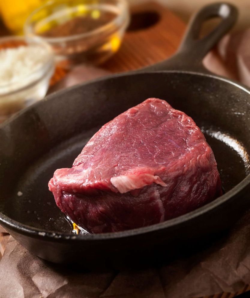 PHOTO: Steak fillet is prepared to be cooked in a cast iron skillet.