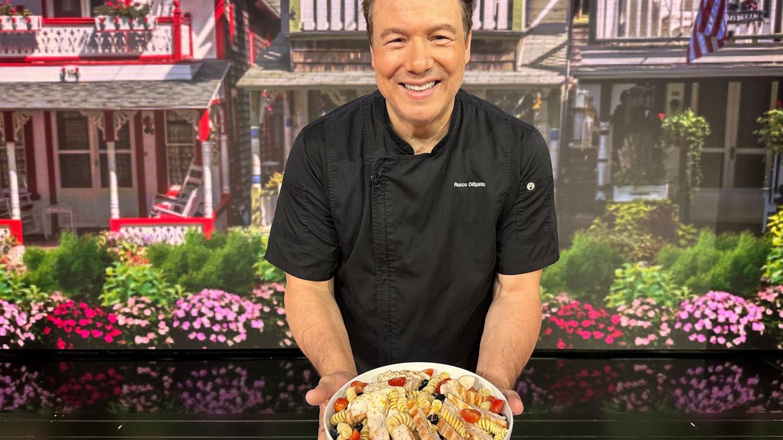 PHOTO: Chef Rocco DiSpirito holds a bowl of his summer pasta salad with chicken.