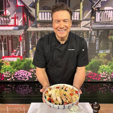 PHOTO: Chef Rocco DiSpirito holds a bowl of his summer pasta salad with chicken.