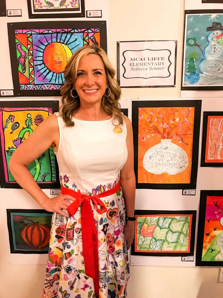 PHOTO: Art teacher Rebecca Bonner had her students draw all over her dress as part of a project. 