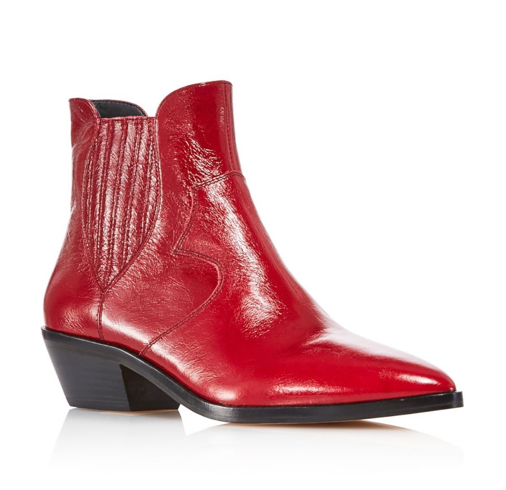PHOTO: Style Hint: Can a red stiletto be replaced by this statement boot? It can when this season everyone from celebs to fashion editors are skipping painful heels for down- to-earth flats.