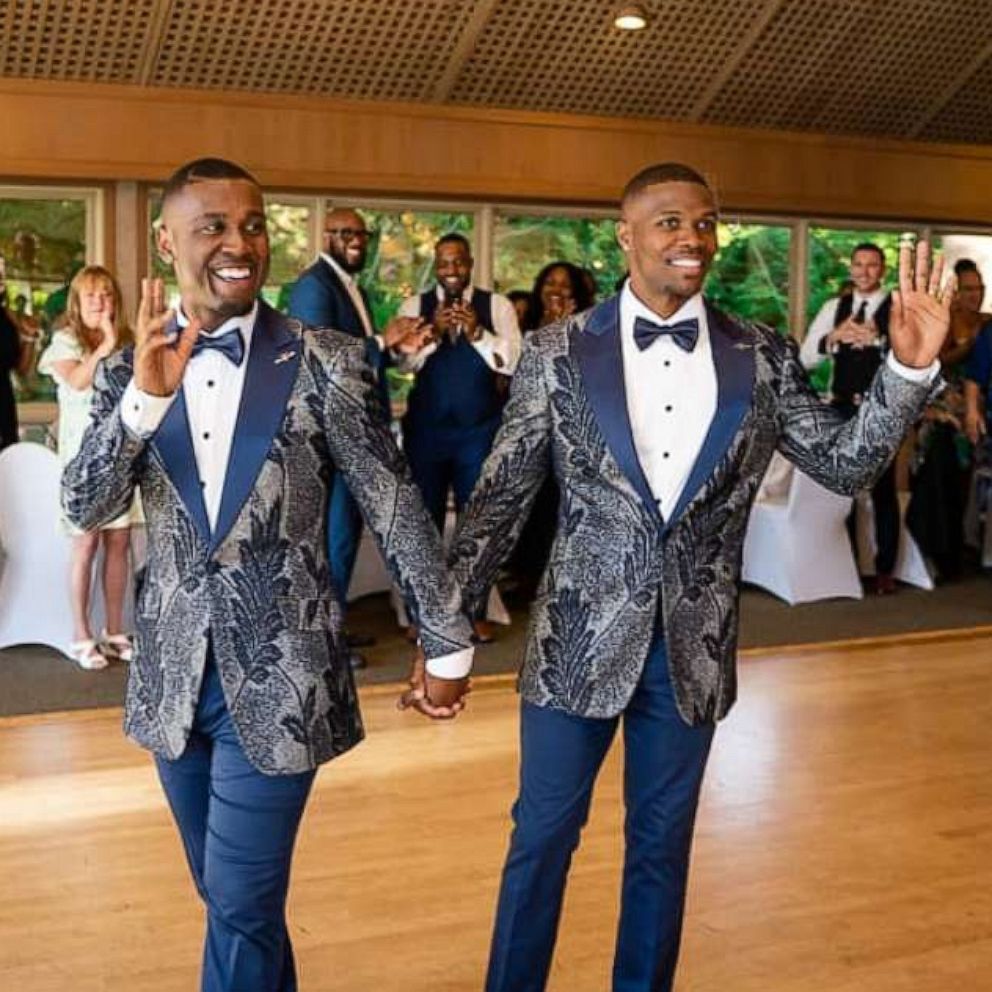 VIDEO: Grooms stun weddings guests with epic flash mob at their reception 