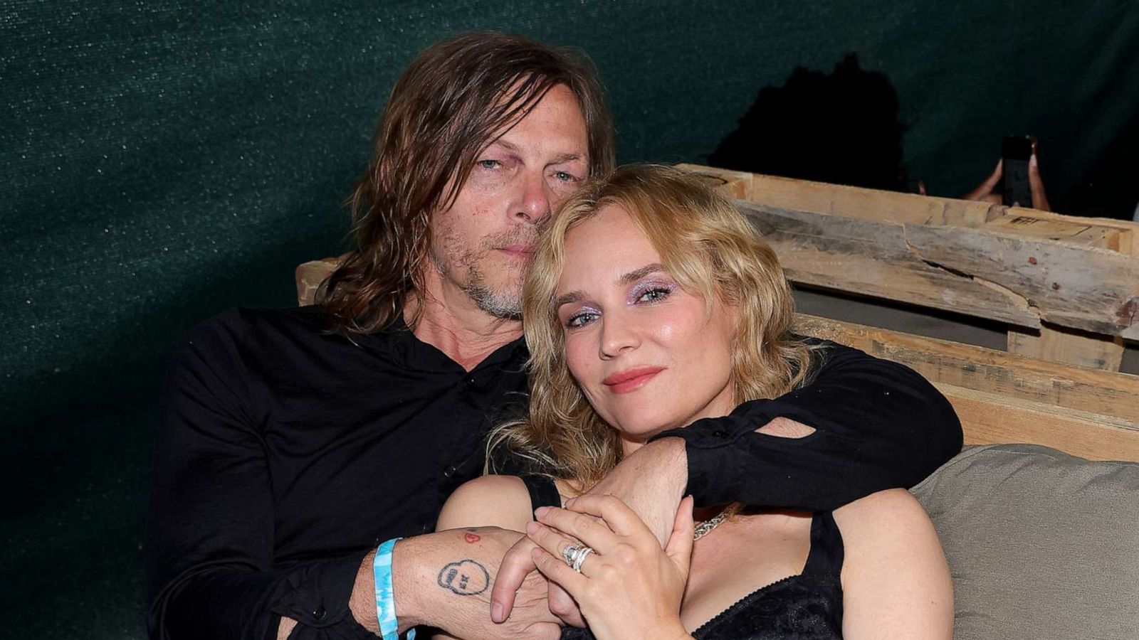 PHOTO: Norman Reedus and Diane Kruger are seen backstage during Global Citizen's Power Our Planet: Live in Paris, June 22, 2023, in Paris.