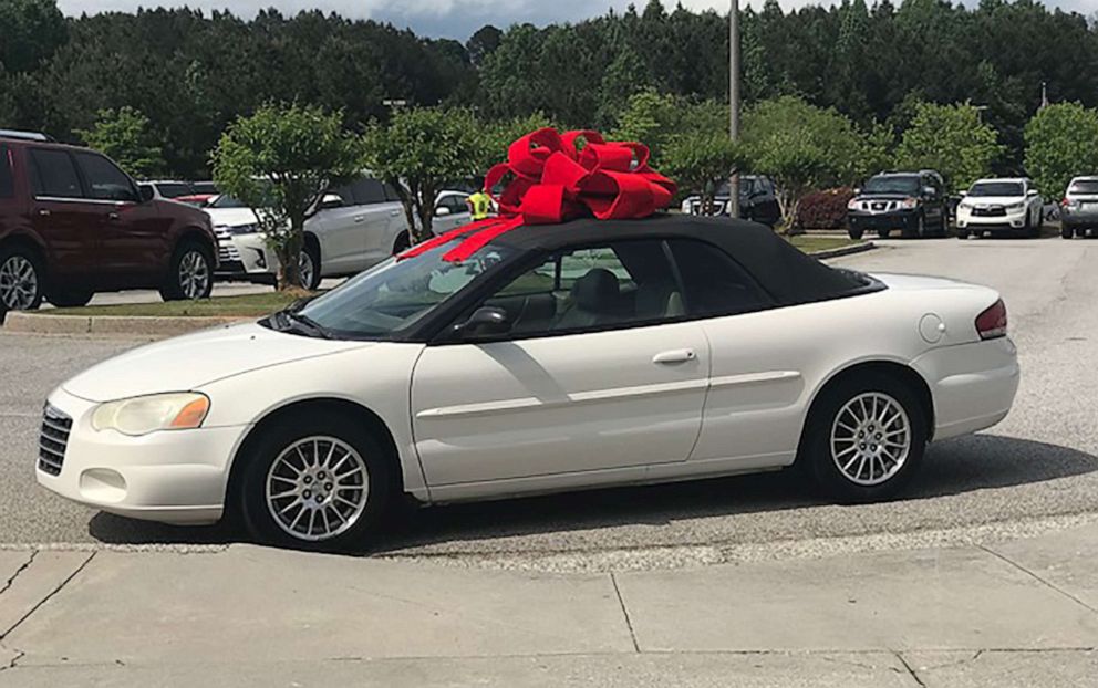 PHOTO: In early May, after a game in Mount Taber Park, team members and their families surprised referee Lemuel Buster with a car and $2,000 in gift card donations.