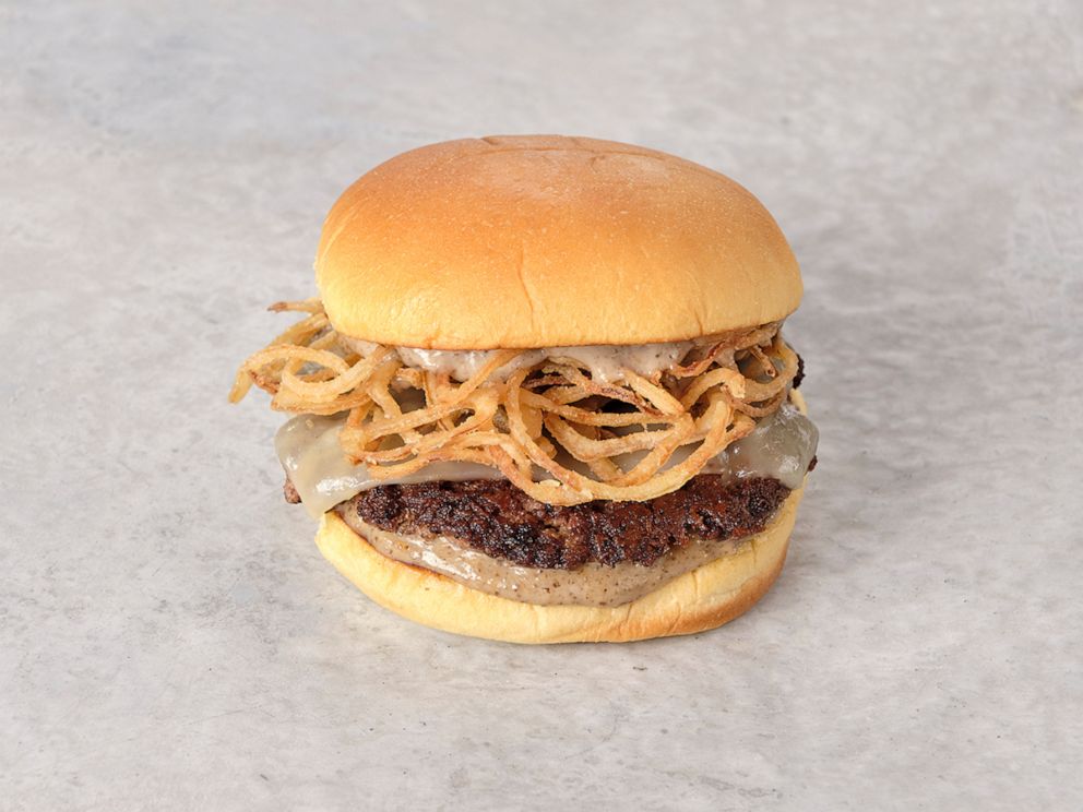 PHOTO: The new black truffle sauce on a Gruyère cheeseburger with crispy shallots from Shake Shack and Regalis Foods.
