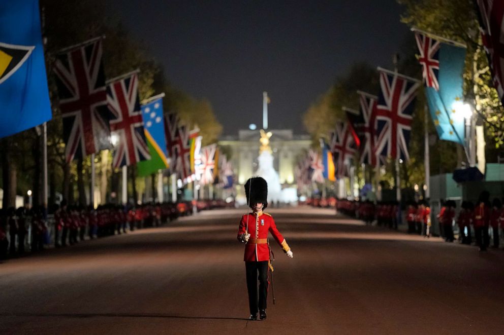 PHOTO: A member of the military marches on The Mall, in central London, early Wednesday, May 3, 2023, during a rehearsal for the Coronation of King Charles III
