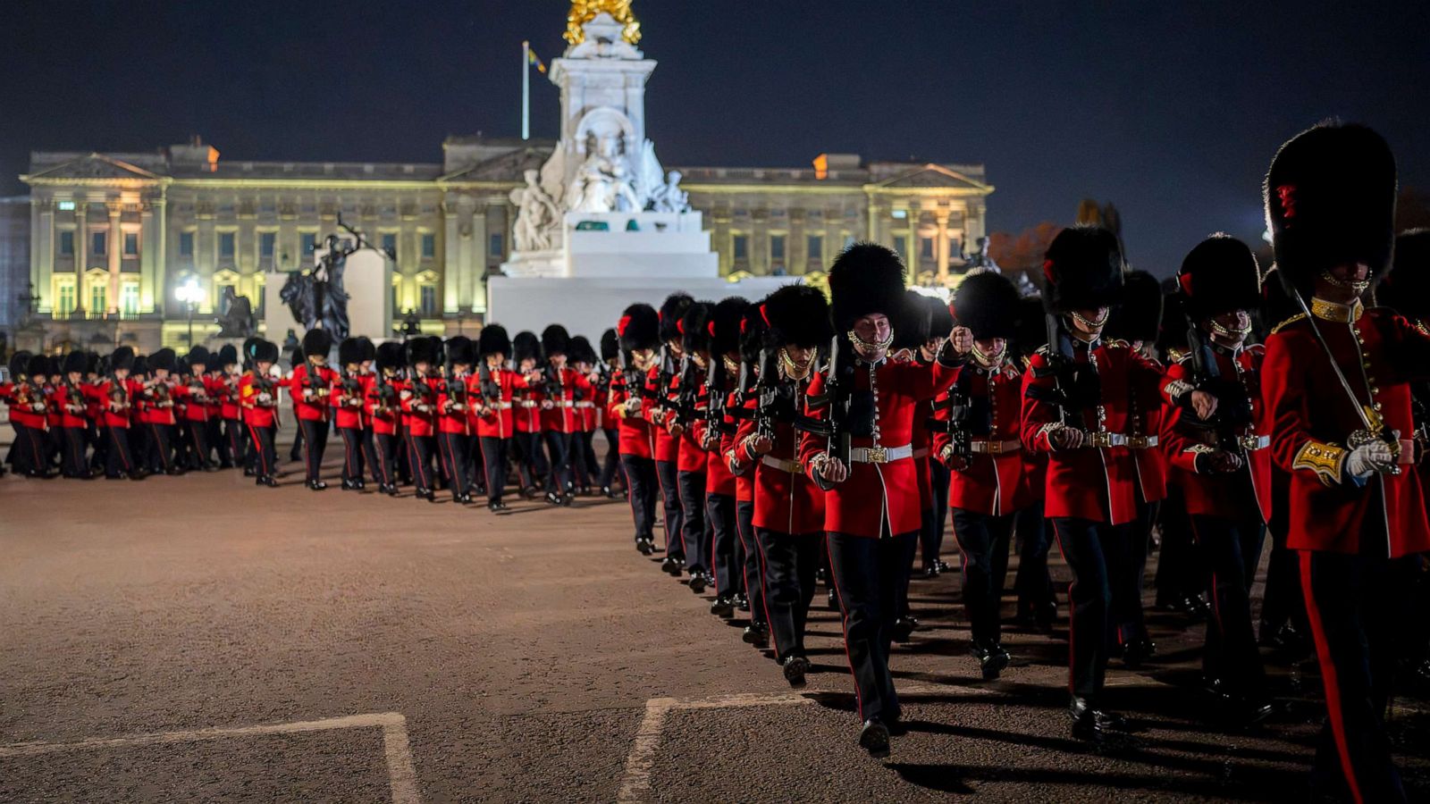 PHOTO: Members of the military march near Buckingham Palace in central London, May 2, 2023 during a rehearsal for the coronation of King Charles III which will take place at Westminster Abbey on May 6.