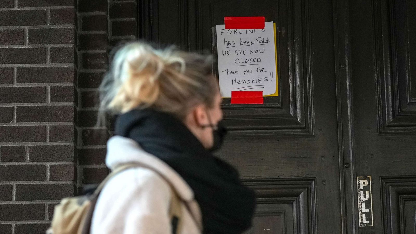 PHOTO: In this April 1, 2022, file photo, Forlini's, a 79-year-old restaurant located in the Little Italy neighborhood of New York, has a sign on their door announcing they are officially closed.